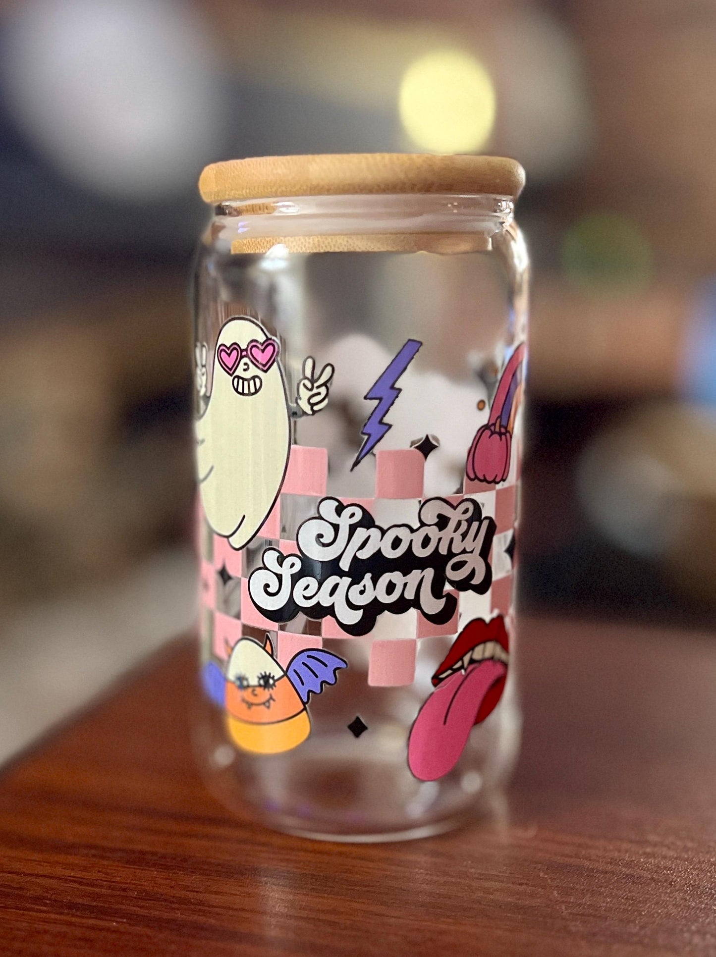 Spooky Season Glass Jar | Pink Halloween Ghost, Pumpkin, and Candy Corn Design | Retro Checkered Aesthetic with Bamboo Lid | Cute Fall Decor - Tomes and Troves