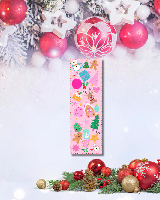 Pink Christmas bookmark with reindeer, gingerbread, and snowman illustrations — Tomes & Troves