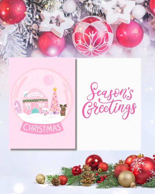 Pink Christmas greeting card with snow globe illustration and Season’s Greetings text — Tomes & Troves