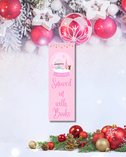 Pink “Snowed In With Books” Christmas bookmark with snow globe illustration — Tomes & Troves