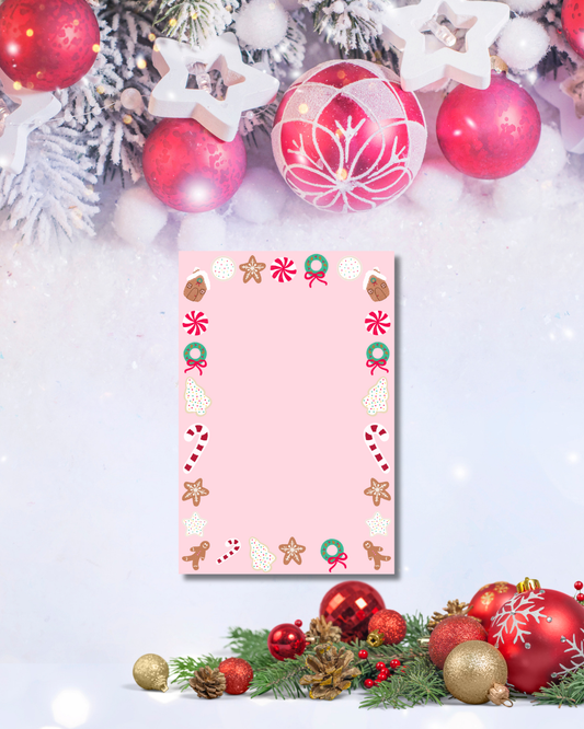 Pink Christmas notepad with gingerbread, candy cane, and holiday cookie border — Tomes & Troves