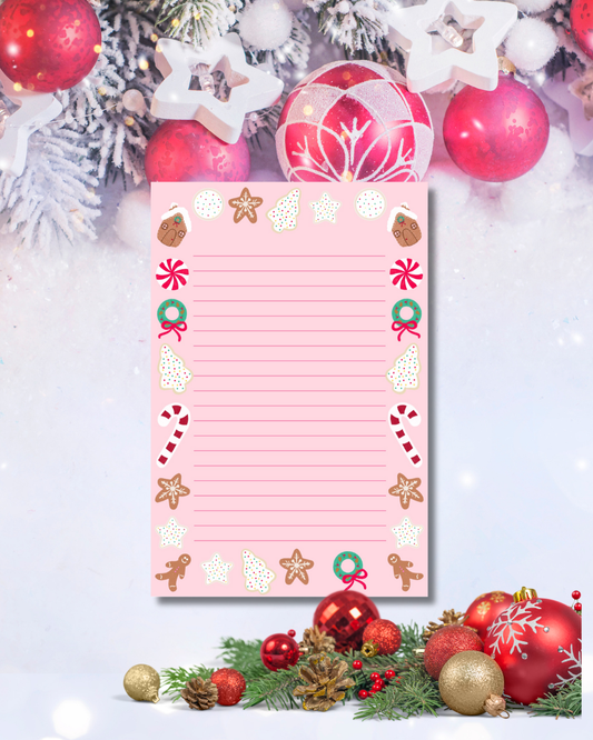 Pink Christmas lined notepad with gingerbread, candy cane, and wreath border — Tomes & Troves