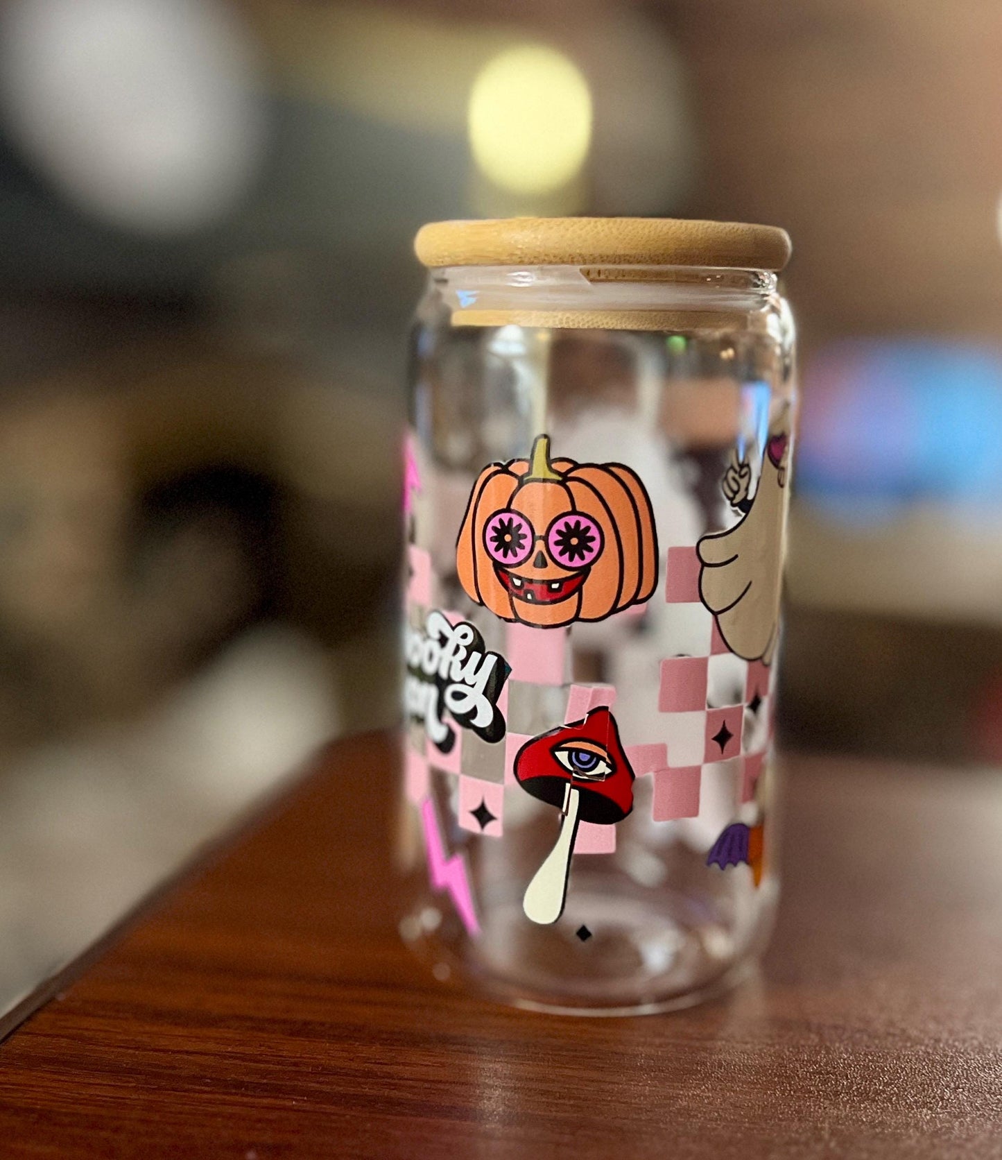 Spooky Season Glass Jar | Pink Halloween Ghost, Pumpkin, and Candy Corn Design | Retro Checkered Aesthetic with Bamboo Lid | Cute Fall Decor - Tomes and Troves