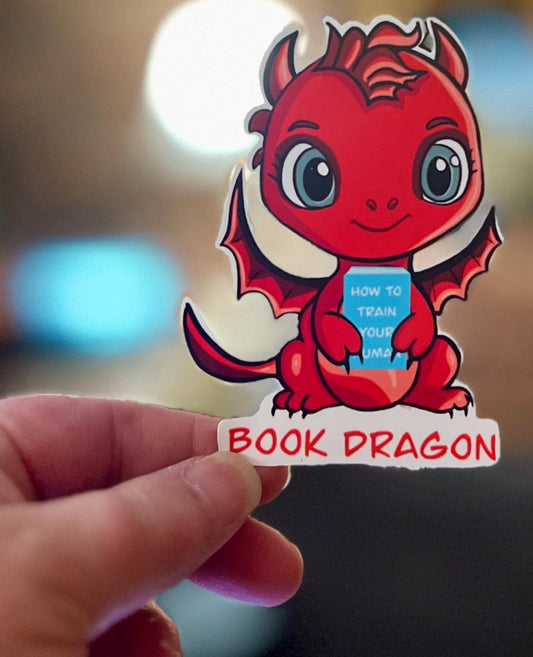 Book Dragon Sticker | Cute Red Dragon Holding ‘How to Train Your Human’ Book | Waterproof Die Cut Sticker for Readers & Fantasy Lovers - Tomes and Troves